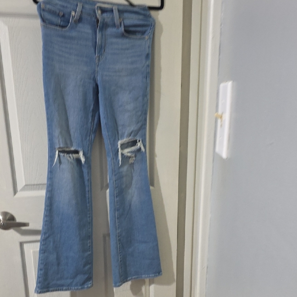 Levi's Light Blue Flare Jeans with Distressed Knees